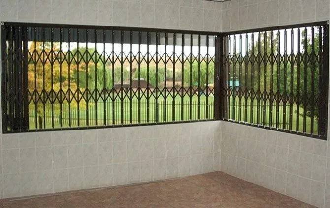 Step-by-step installation of burglar bars on aluminium windows showing drilling process